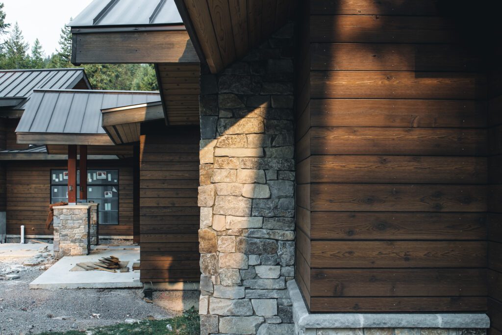 A building with Glacier Millworks Timber Forge fir siding showcases deep, warm tones and clean horizontal lines.